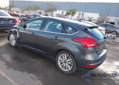 2016 Ford Focus Titanium z USA, uszkodzony, nr VIN 1FADP3N22GL254672